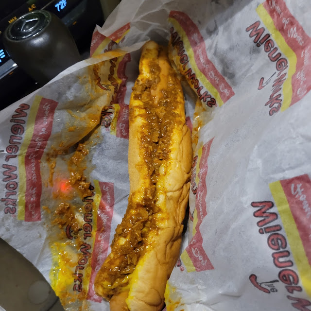 Foot Long Hot Dog with Ketchup Mustard and Chilli