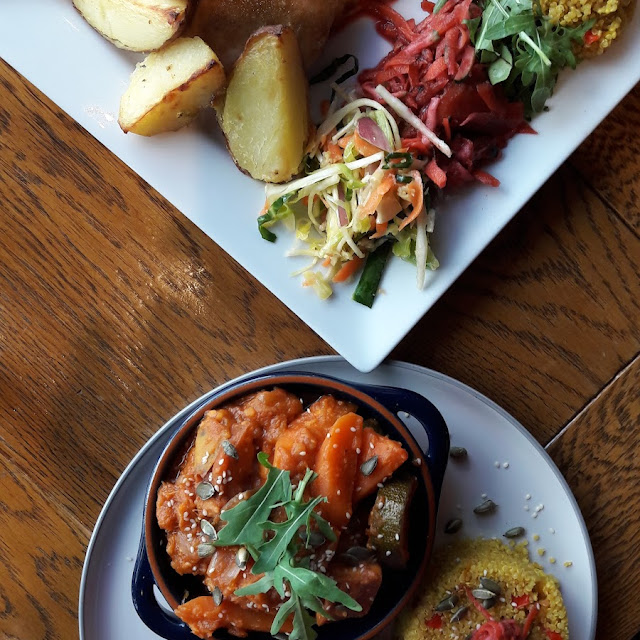 Top Jerk Chicken Bottom Moroccan Vegetable Tagine