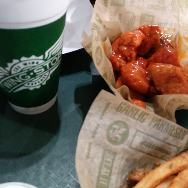 Lemon Pepper Boneless Chicken Wings and a Order of Hot Boneless Chicken Wings